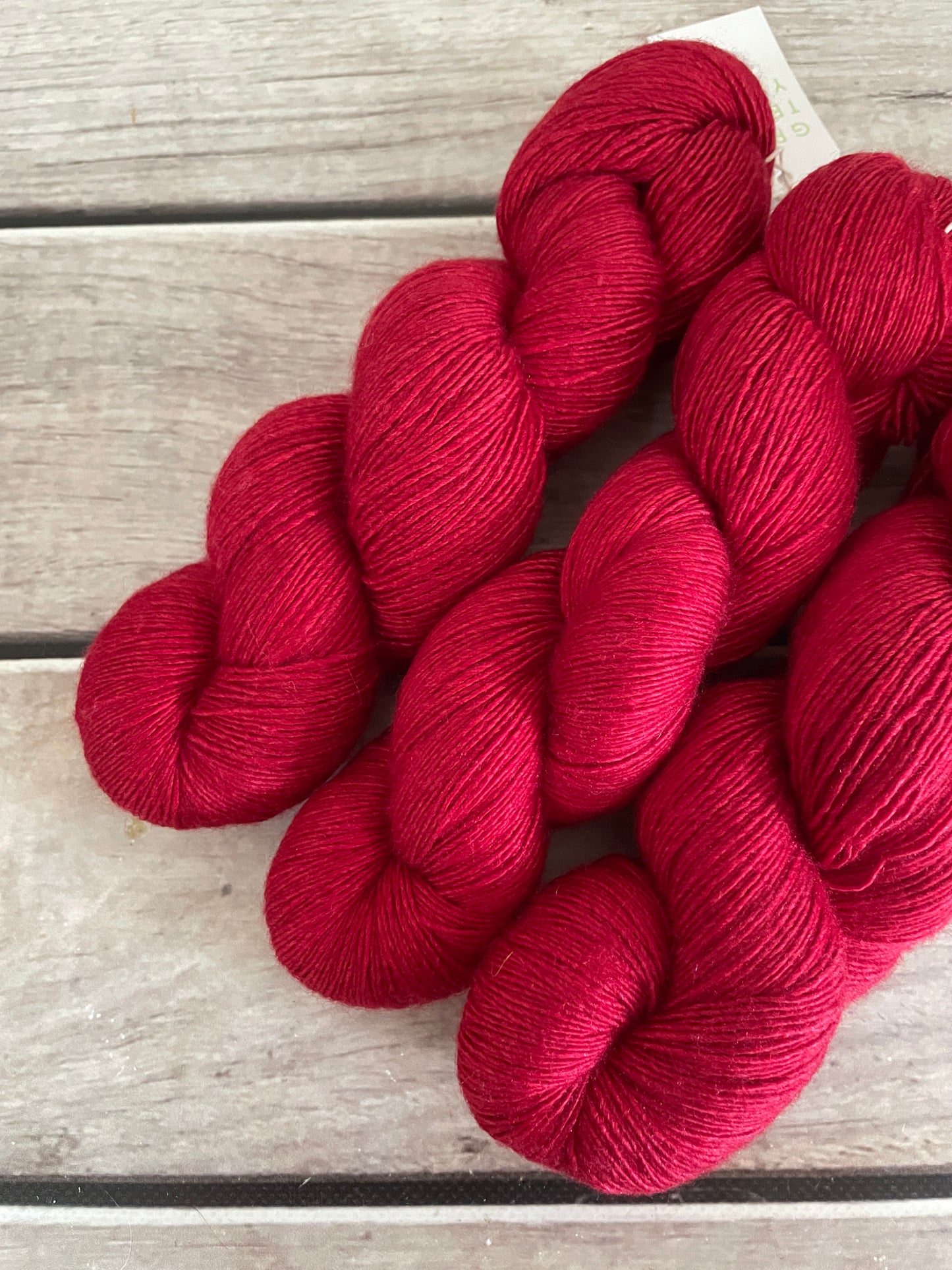 Red Lacquer on Merino and Silk 4 ply single - Osmanthus
