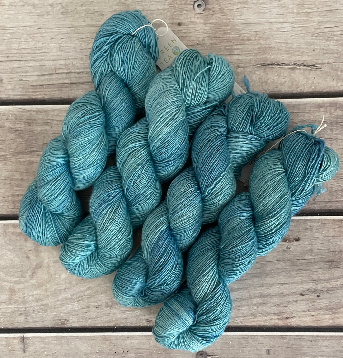 Turquoise bay Dark - on Merino and Silk 4 ply single - Osmanthus