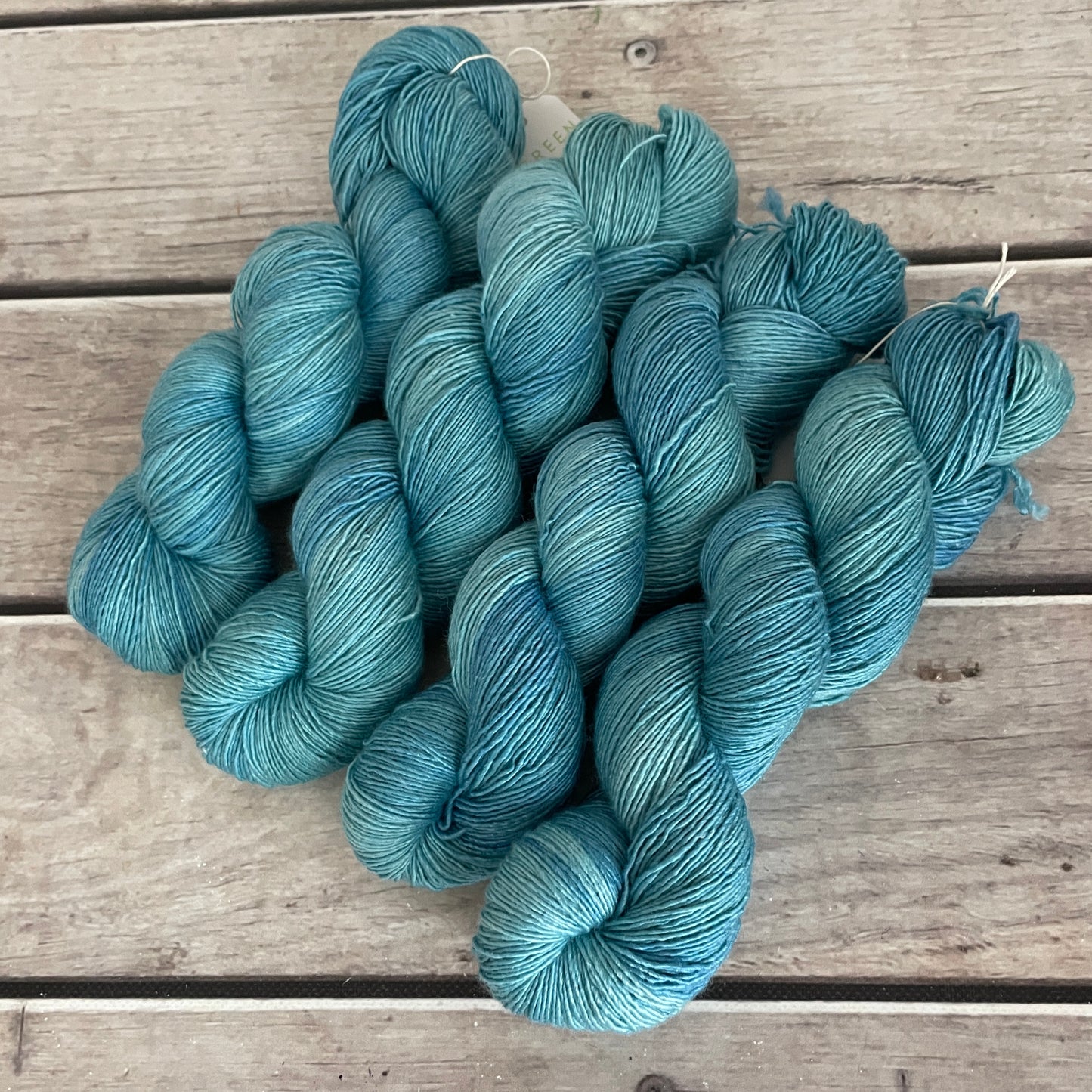 Turquoise bay Dark - on Merino and Silk 4 ply single - Osmanthus