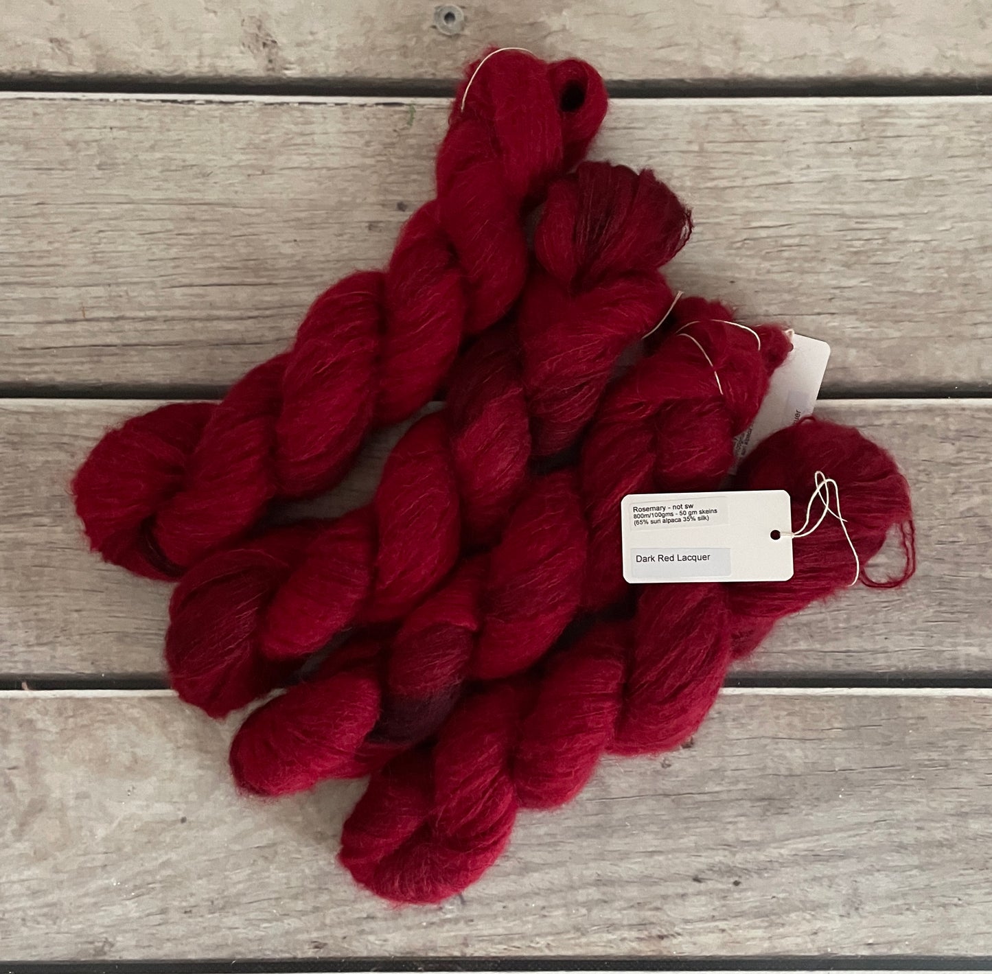 Dark Red Lacquer - 2 ply Suri/merino fluff - Rosemary