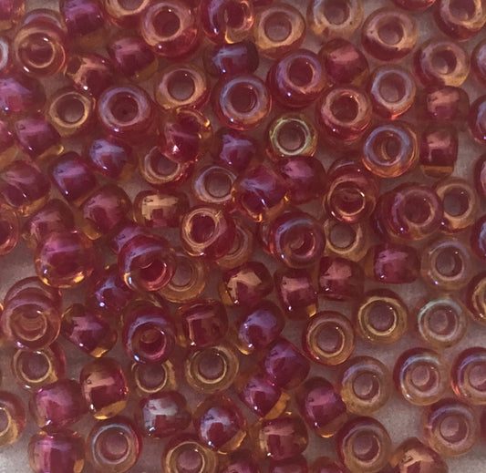 Miyuki 6 - Cranberry lined Topaz AB