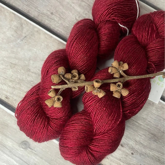 Dark Red Lacquer on Merino and Silk 4 ply single - Osmanthus