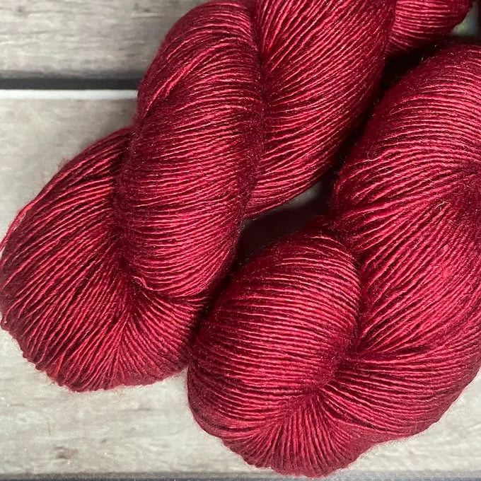 Dark Red Lacquer on Merino and Silk 4 ply single - Osmanthus