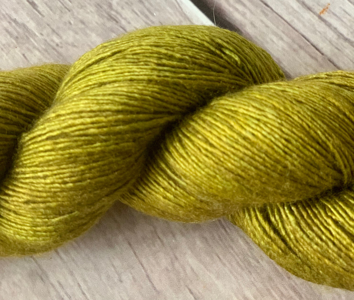 Someone's Sweater on Merino and Silk 4 ply single - Osmanthus