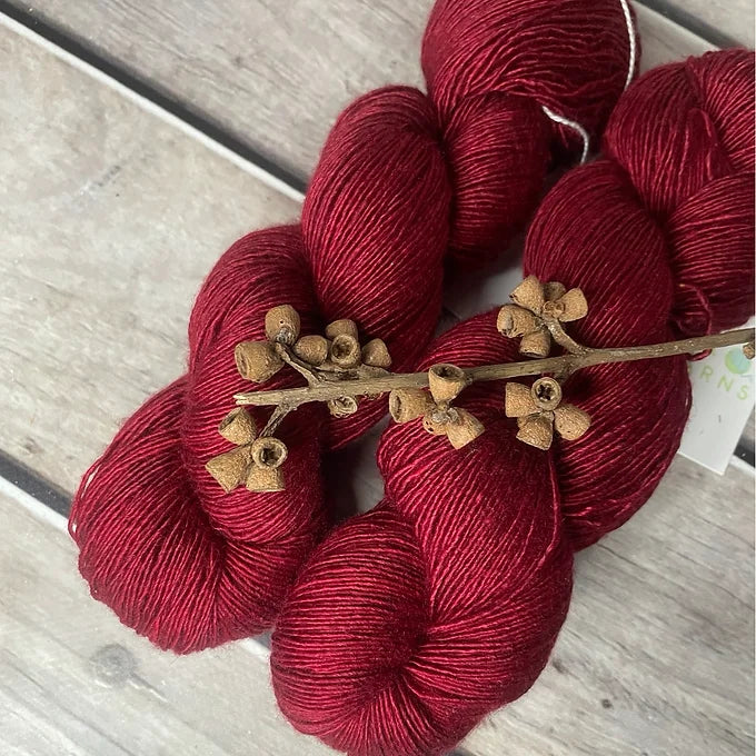 Dark Red Lacquer on Merino and Silk 4 ply single - Osmanthus